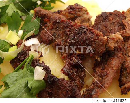 Meat with a potato on a plate 4851625