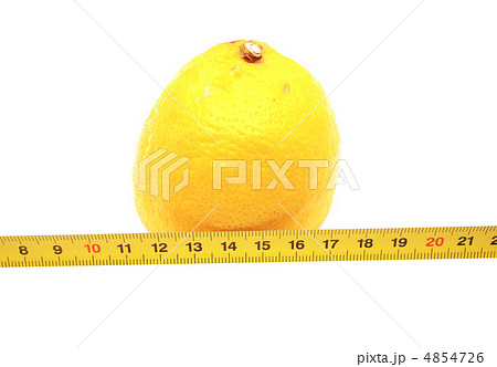 Lemon and a ruler on a white background 4854726