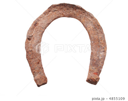a rusty old horseshoe on a white background a rusty old horseshoe on a white background 4855109