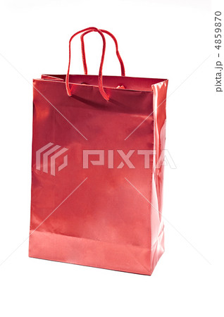 A view of a red shopping bag isolated on white A view of a red shopping bag isolated on white 4859870