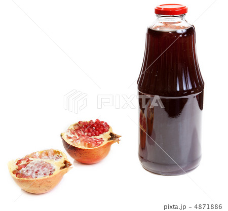 Bottle of juice and ripe piece grenade Bottle of juice and ripe piece grenade 4871886