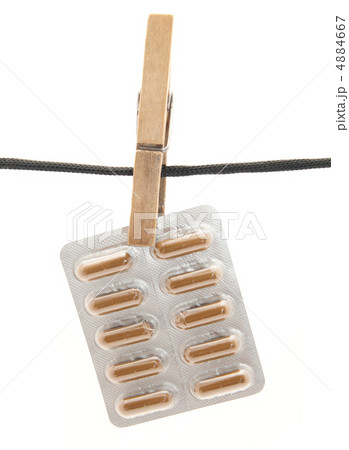 tablets on a clothespin tablets on a clothespin 4884667