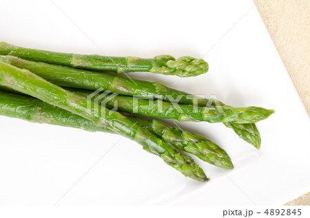 Fresh asparagus on white 4892845