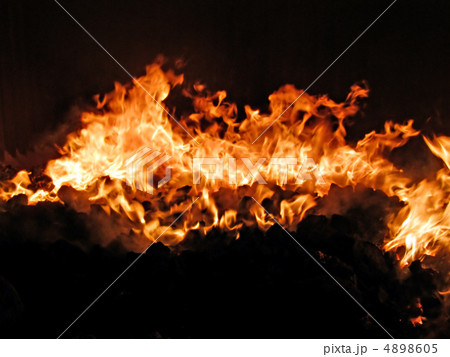 fire in stove fire in stove 4898605