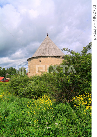 tower to old fortress amongst green tree tower to old fortress amongst green tree 4902733