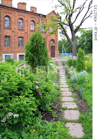 lane in park near old-time building 4902735