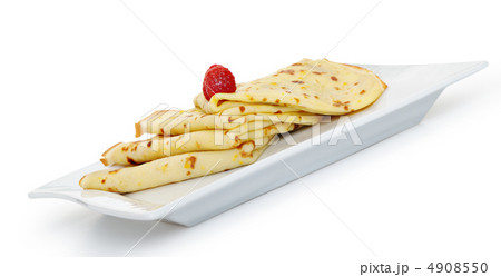 Crepe on a plate with a raspberry 4908550