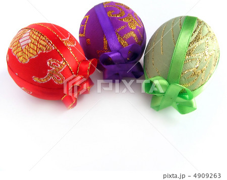 Easter painted egg tied up by tapes 2 4909263