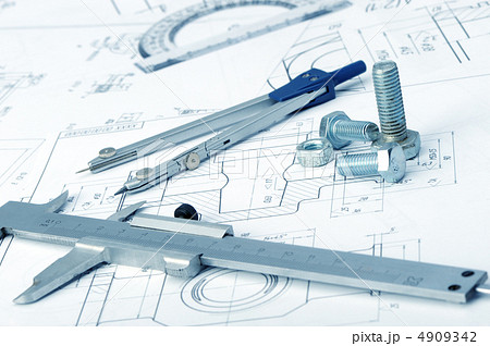 The plan industrial details, a screws, caliper, divider. A photo 4909342