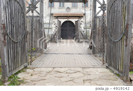 Input and suspension bridge in old castle Input and suspension bridge in old castle 4919142
