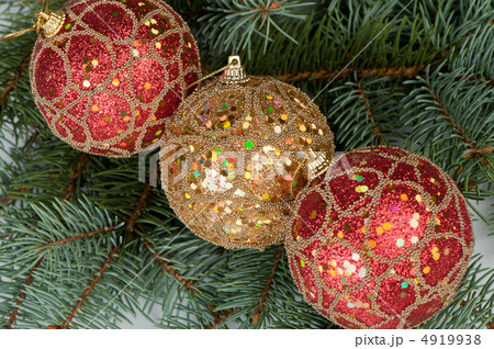 Christmas toys on branches of a fur-tree 4919938