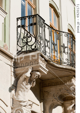 Facade of a building with a balcony. 4920171