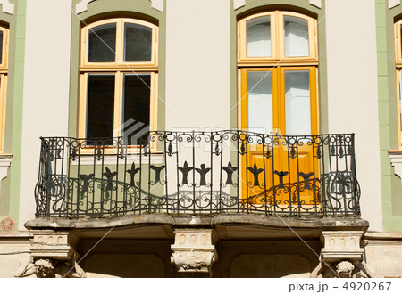 Facade of a building with a balcony. 4920267