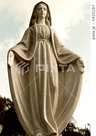 Monument Lady of Guadalupe on a cemetery Monument Lady of Guadalupe on a cemetery 4920287