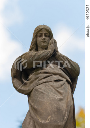 Monument Lady of Guadalupe on a cemetery Monument Lady of Guadalupe on a cemetery 4920325