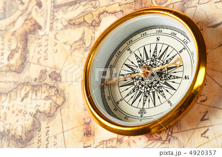 Old compass on ancient map Old compass on ancient map 4920357