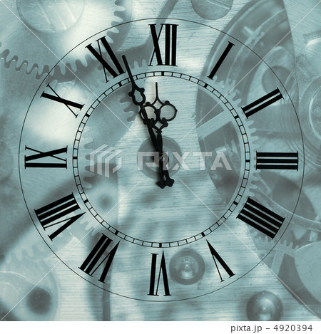 Old hours with figured arrows on mechanism blur background 4920394