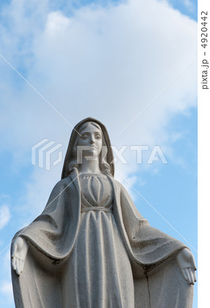 Monument Lady of Guadalupe on a cemetery 4920442