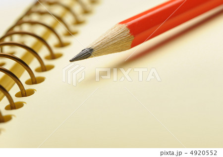 Notebook yellow paper and red pencil 4920552