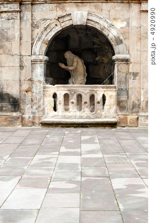 Monument praying elder in a cave Monument praying elder in a cave 4920990