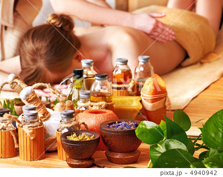 Woman getting massage in luxury spa. Woman getting massage in luxury spa. 4940942