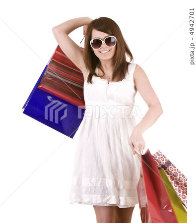 Girl in glasses with gift bag shopping. Girl in glasses with gift bag shopping. 4942701