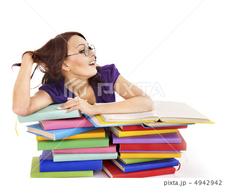 Girl in glasses with stack book . 4942942