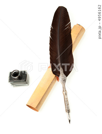Feather quill ,inkwell and parchment roll 4956162