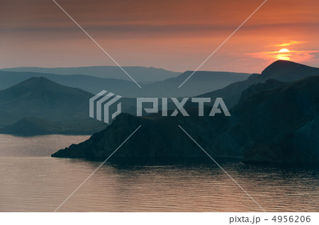 Colourful decline over mountains and the sea. Colourful decline over mountains and the sea. 4956206