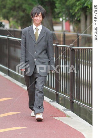 制服姿の男子高校生の写真素材