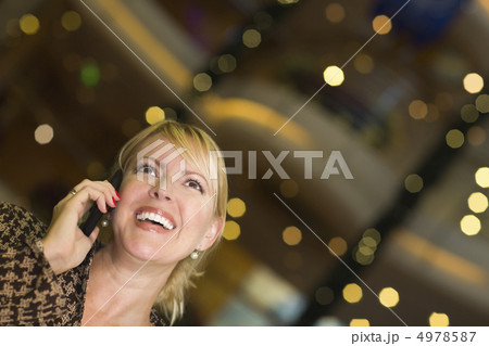 Blonde Woman On Her Cell Phone in the City Lights 4978587