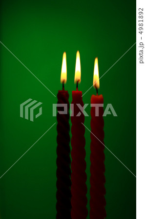 Three Candles On Green 4981892