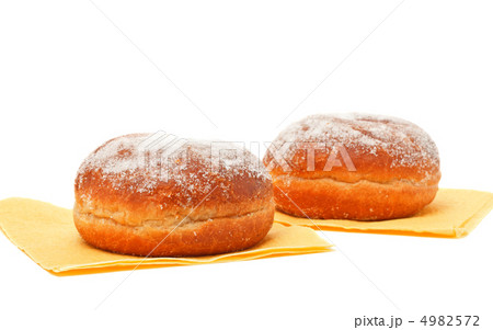 two donuts in powdered sugar two donuts in powdered sugar 4982572