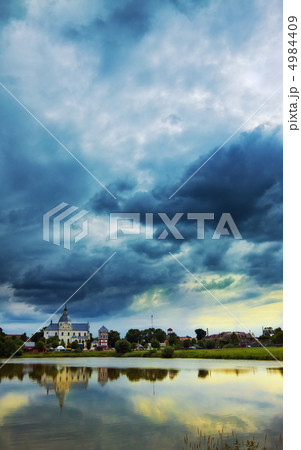 monastery on lake at evening 4984409