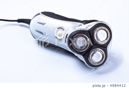 electric shaver on grey background 4984412