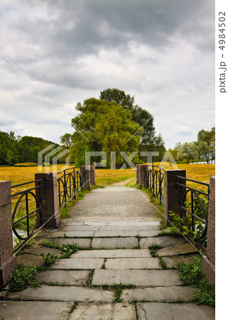 stone bridge to meadow 4984502