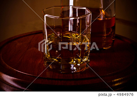 whiskey glass on wooden tray 4984976