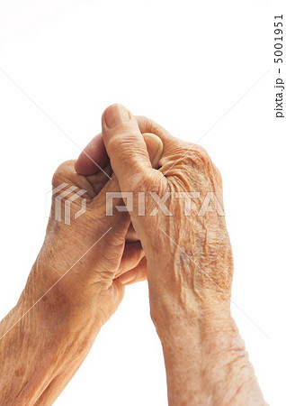 Senior woman's hands isolated on white 5001951