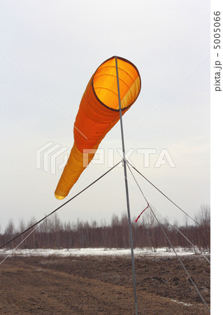 Wind direction Flag on blue cloud sky in  wind 5005066