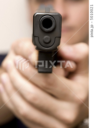 Man pointing a gun. 5010021
