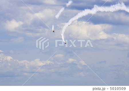Several planes performing in an air show at Jones Beach Several planes performing in an air show at Jones Beach 5010509