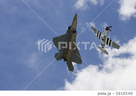 Two planes performing in an air show Two planes performing in an air show 5010540