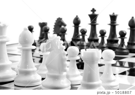 Chess on board over white Chess on board over white 5018807