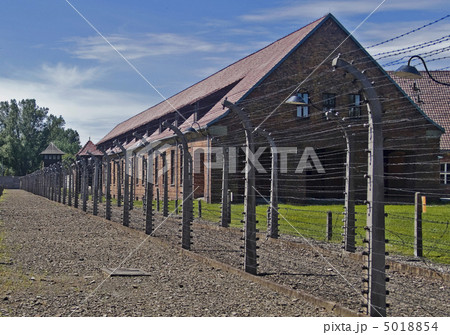 Wire fence and barrack in A uschwitz - Birkenau concentration ca 5018854