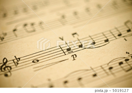 Classical music - notes on yellowed vintage paper sheet 5019127