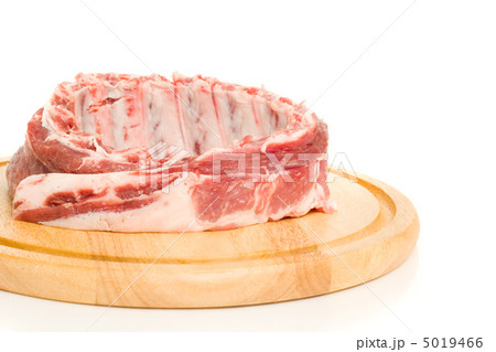 Tasty Pork ribs on round hardboard 5019466