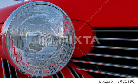 Headlight of red retro car Headlight of red retro car 5021290