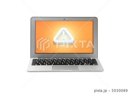 ノートpc画面に注意マークの写真素材