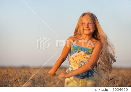 The girl in filed wheats. 5034620