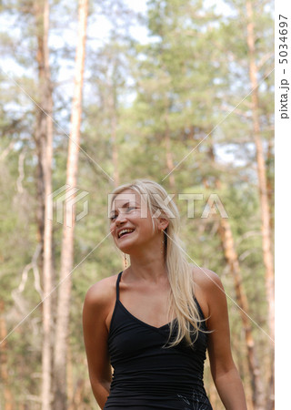 The girl blonde in forest The girl blonde in forest 5034697